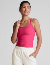 pink waist length tank top with adjustable straps.